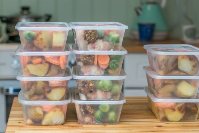 Storage containers filled with food for meal prepping