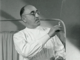 Doctor preparing needle