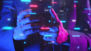 Man using his phone to invest in cryptocurrency