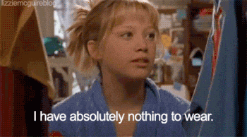 A gif of a teenage girl in a closet full of clothes, with the words, "I have absolutely nothing to wear."