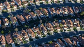 Aerial view of neighborhood homes and streets in a suburban subdivision