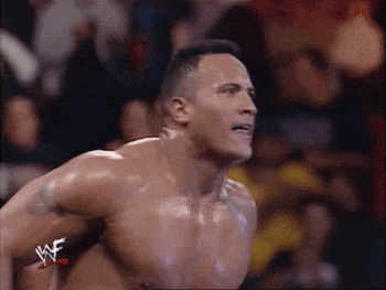 A gif of The Rock in a wrestling ring, turning around and sniffing the air