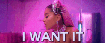 A gif of Ariana Grande dancing in a pink-lit room, with the words, "I want it, I got it."