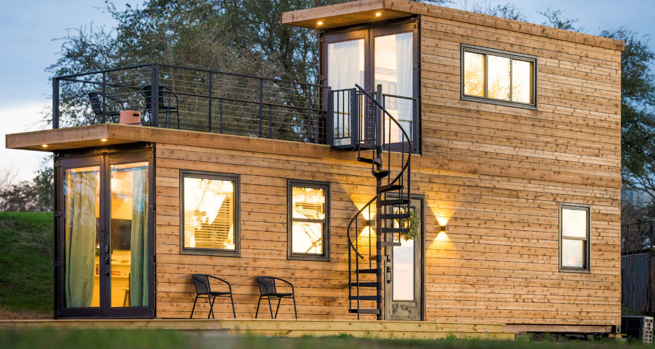 A container home with a balcony