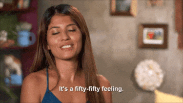A gif of a woman from 90 Day Fiance saying, "It's a fifty-fifty feeling."