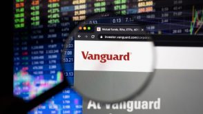 Magnifying glass showing Vanguard's logo