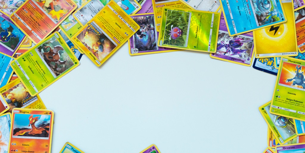 assortment of Pokémon cards in a pile. From "How to sell bulk Pokémon cards and make some serious cash!"