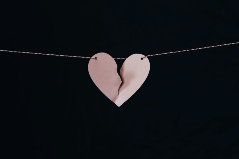 broken heart hanging on wire; divorce budget