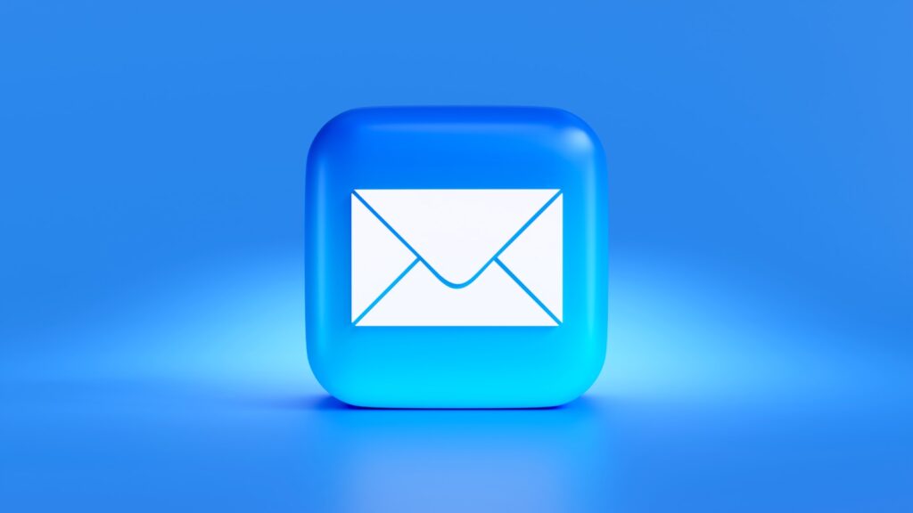 a blue button with a white envelope on it; AI email marketing assistant