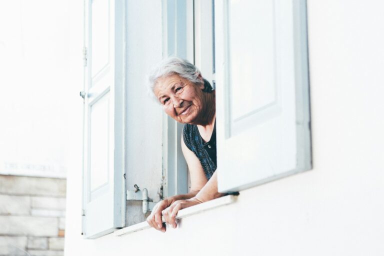 woman peeping at window; long-term care