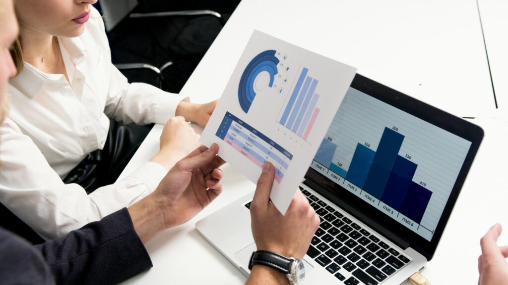 finance brokers reviewing a report