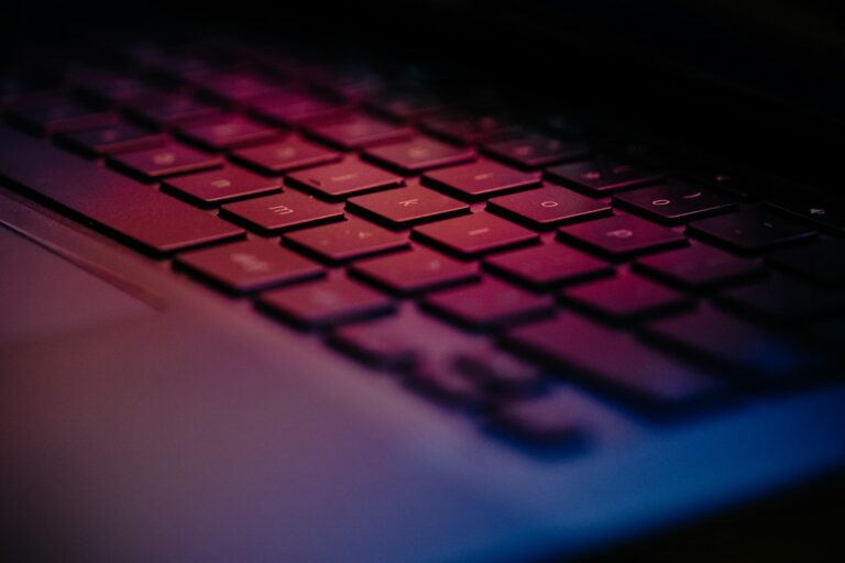 a close up of a keyboard with a blurry background; CSPM tools